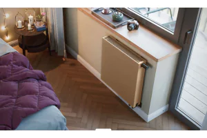 Grzejnik panelowy do salonu – dlaczego warto wybrać model z płaskim frontem?